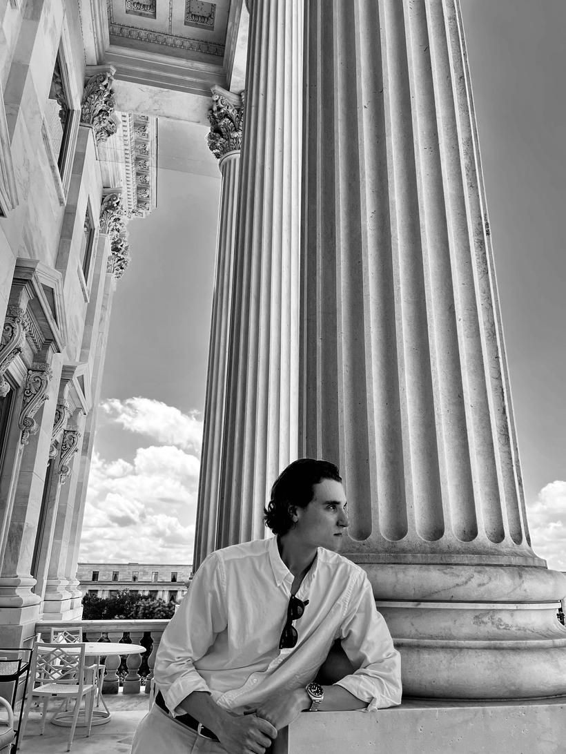 The candidate recreating the Kennedy photograph on the same Capitol balcony